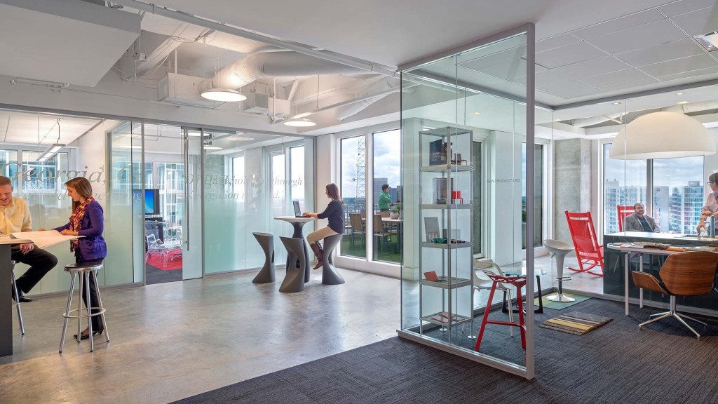 A group of people sitting at tables.